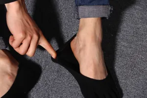 Men black toe socks detail view showing elastic low cut invisible design comfortable fit.