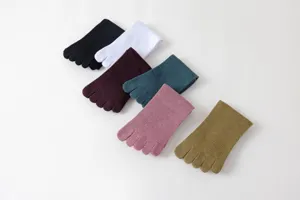 Detailed view of colorful five-toe socks set featuring breathable fabric and cozy fit.