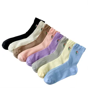 Women's mid-tube socks featuring cute tulip embroidery, ribbed knit design, spring summer daily wear.
