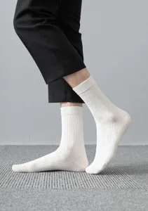 Men's white ribbed cotton mid-calf socks, comfortable casual athletic knit hosiery detail.