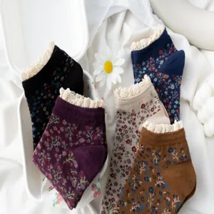Detail shot of women floral lace short socks featuring retro style and comfortable cotton fabric.
