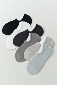 Detailed shot of breathable mesh men boat socks, low cut invisible design in multi assorted colors.
