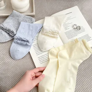 Women thin hollow mid-tube socks bow ballet style ruffle stackable socks daily wear.
