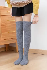 Cozy grey over-the-knee fuzzy socks for women, thick warm winter thermal sleep wear hosiery.