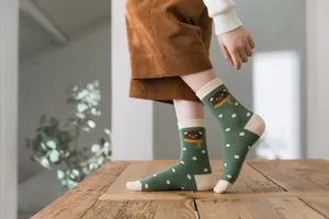 Cozy thick thermal mid-tube cotton socks for women featuring cute cartoon bear and polka dots design.