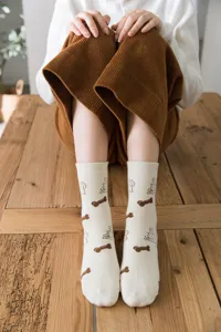 Comfortable thick cotton mid-tube socks featuring cute puppy and bone patterns for autumn and winter.