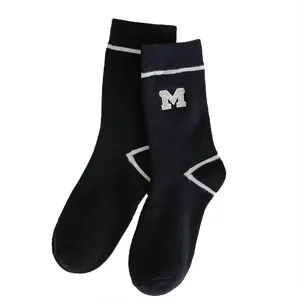 Thickened black crew socks winter fleece-lined thermal sports towel socks with M letter embroidery.