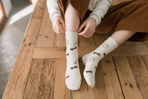 Thickened cute dog pattern cotton mid-tube socks for women, perfect for autumn and winter.