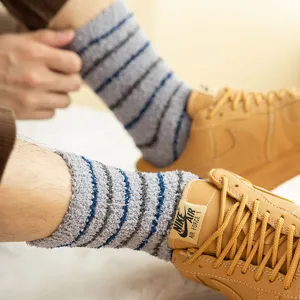 Thickened coral fleece men socks with warm striped design, soft sleep floor socks for winter.