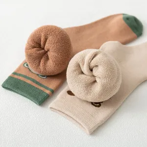 Thickened winter cotton socks for women, cute dog design, cozy fleece mid-tube style.