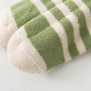 Green and white striped terry socks for women, cozy winter short athletic towel socks main.