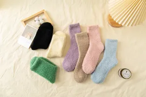 Soft fuzzy coral fleece winter socks in multiple vibrant colors, cozy warm daily wear detail.