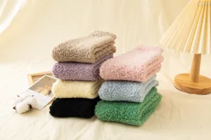 Cozy coral fleece women socks in vibrant colors, winter warm mid-tube solid casual daily wear.