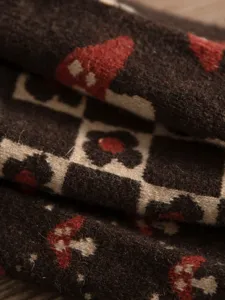 Cozy brown wool blend mid-calf socks with cute mushroom and checkerboard knit patterns.