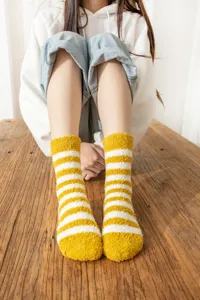 Cozy coral fleece striped mid-calf socks for women, thick and warm winter casual hosiery.