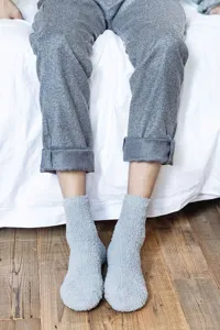 Men's cozy plush fleece sleep socks in solid gray, soft winter thermal floor socks detail.