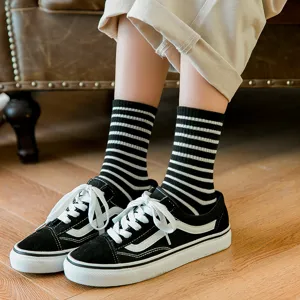Classic black and white striped cotton mid-calf socks for women, soft and stylish daily wear.
