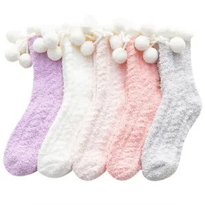 Cute fuzzy fluffy winter socks with pom poms, soft warm coral fleece socks for women