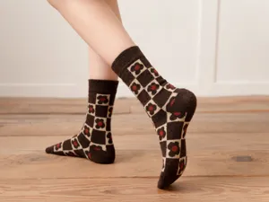 Coffee color women thermal wool socks featuring chic checkerboard floral pattern detail.