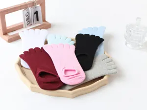 Close-up detail of soft breathable five-toe no-show socks in assorted lovely pastel colors.