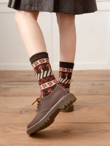 Cozy women wool blend mid-calf socks featuring vintage retro mushroom and flower knit pattern for winter.
