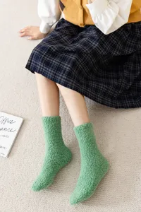 Solid color coral fleece warm winter mid-tube women socks for cozy daily indoor wear.