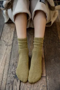 Cozy winter thick solid color thermal fleece lined knit crew socks detail view for women.