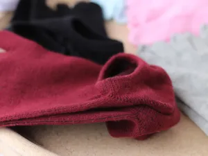 Women toe socks detail shot, soft knitted multi-color five-finger short socks fabric close-up.