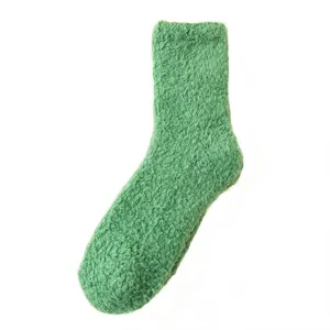 Green solid color coral fleece socks for women, soft winter mid-tube warm sleep socks.