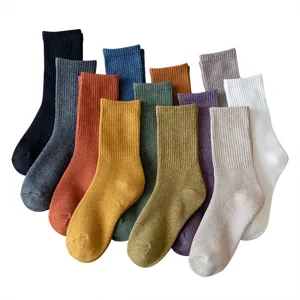 Thickened loop knit winter socks for women, solid color casual crew socks, cozy thermal hosiery.