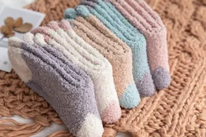Cozy plush fuzzy socks for women, thick winter warm coral fleece sleep socks in pastel colors.