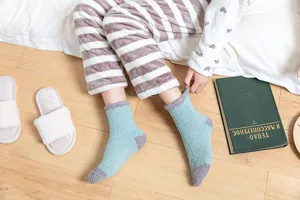 Cozy coral fleece women winter warm sleep socks, soft thick mid-tube fuzzy socks for indoor home wear.