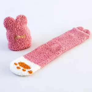 Cute fuzzy coral fleece socks for women, winter warm floor socks with cat paw design.