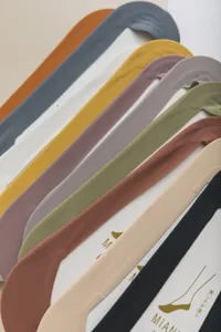 Ice silk boat socks detail showing V-cut design and various candy colors stacked neatly.