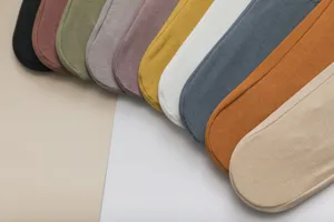 Close-up detail of colorful ice silk boat socks fabric samples, soft breathable solid.