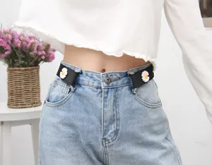 Detail shot of women's invisible elastic buckle-free belt featuring cute white daisy decor.