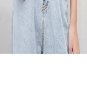 Women's light blue denim jeans waist detail showcasing classic washed fabric and clean stitching.