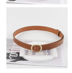 Detailed close-up view of the stylish brown leather belt with a sleek golden oval buckle.