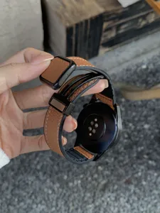 Brown litchi grain leather watch strap with magnetic folding buckle for smart watch.