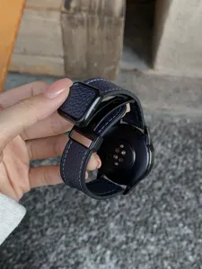 Blue litchi grain leather magnetic folding buckle watch strap replacement accessory.