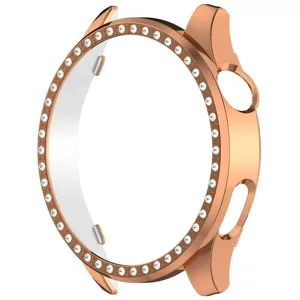 Detalle de cerca de la brillante funda protectora para reloj inteligente en oro rosa.