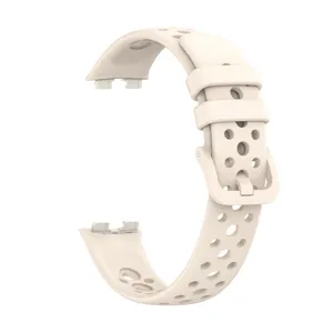 Beige perforated silicone watch band detail shot, breathable replacement strap for smart band.