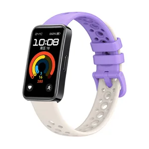 Detailed view of breathable silicone replacement strap with dual-color perforated design.