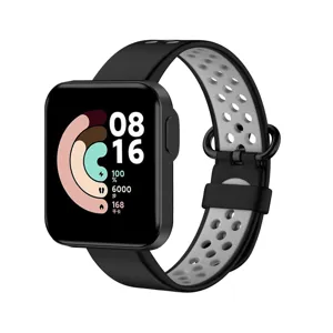 Replacement silicone strap for smart watch, breathable dual-color sports band design.