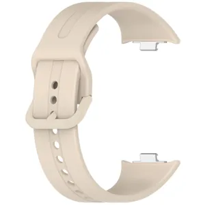 Silicone watch strap replacement detail showing buckle and metal connector for smart watch.