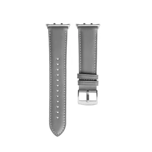 Graues Echtleder Uhrenarmband Detail mit Metallverbindern und klassischer Dornschließe.