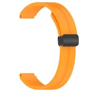 Cinturino per orologio in silicone con fibbia magnetica pieghevole arancione vivace.