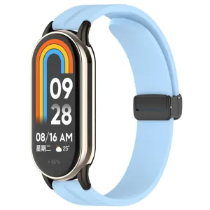 Cinturino di ricambio in silicone per smartwatch con fibbia pieghevole magnetica azzurro.