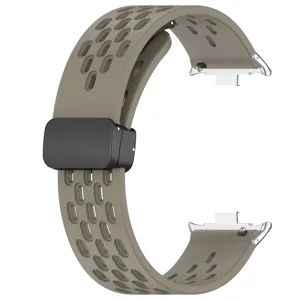 Cinturino di ricambio traspirante in silicone per smartwatch con fibbia magnetica tortora.