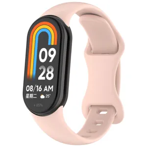 Silicone replacement strap detail, soft pink smart band wristband with secure pin buckle design.